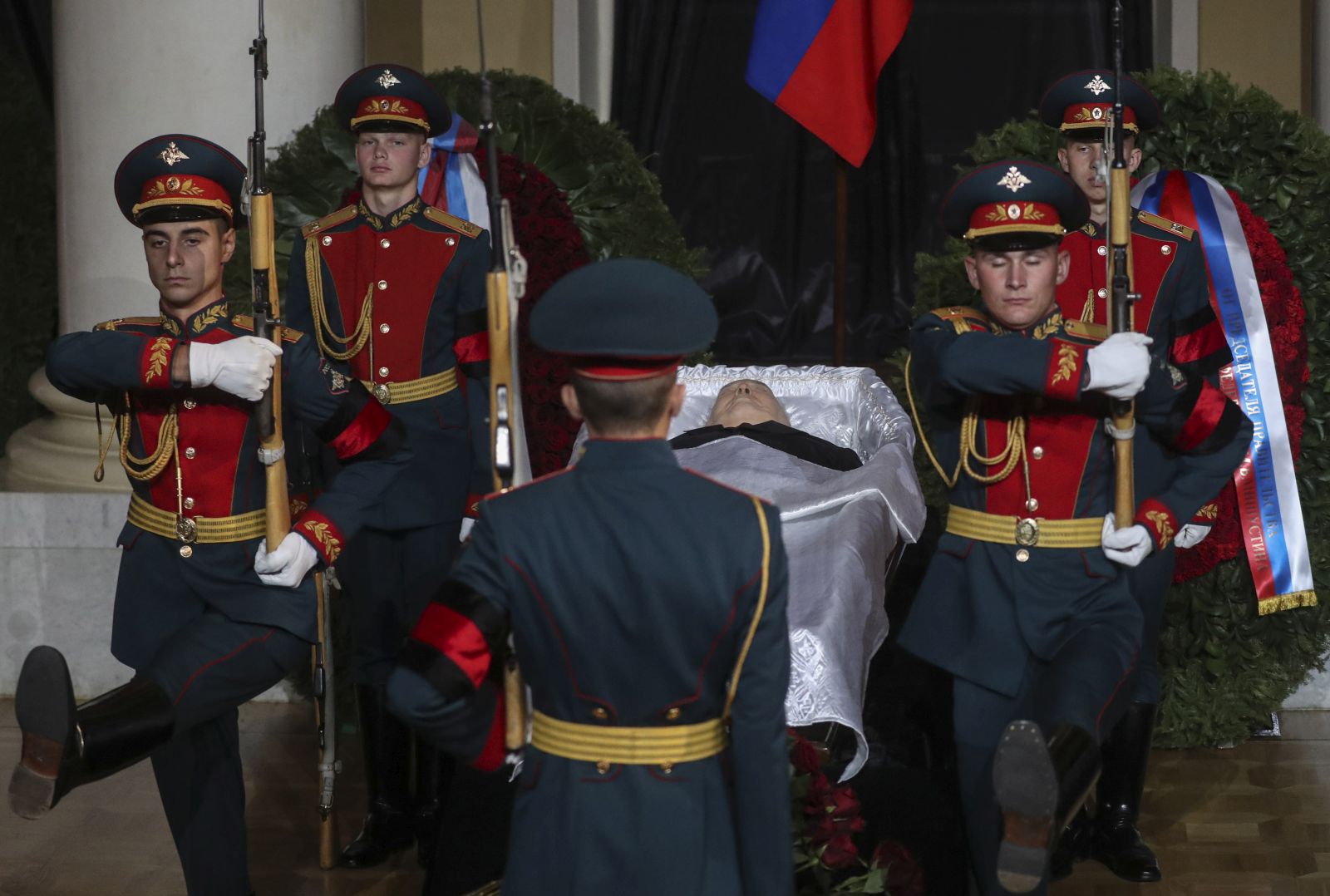 epa10156444 Russian honour guards stand near the coffin with the body of the late former Soviet president Mikhail Gorbachev, during farewell ceremony at the Hall of Columns of the House of Trade Unions in Moscow, Russia, 03 September 2022. Former Soviet leader Mikhail Gorbachev died on 30 August 2022 at the age of 91 in Moscow Central Clinical Hospital. Gorbachev initiated numerous reforms during his tenure. He signed a nuclear arms treaty with the United States and withdrew the Soviet Union from the Soviet-Afghan war. His policies created freedom of speech and press, and decentralized fiscal policy planning and execution to increase efficiency. Gorbachev was the last leader of the Soviet Union, overseeing Russia transition from one party rule to a fragile democracy. Gorbachev will be buried at the Novodevichy Cemetery in Moscow next to the grave of his wife Raisa.  EPA/MAXIM SHIPENKOV