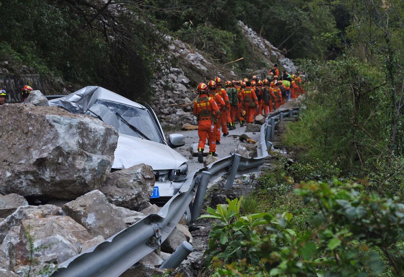 epa10163823 Rescuers search for the injured people after the earthquake in Luding county, Ganzi prefecture, Sichuan Province, China, 06 September 2022. A 6.8 magnitude earthquake hit China’s southwest Sichuan province on 05 September. According to state media, the death toll has risen to at least 65 people, with more than 10 people missing and 200 injured. The strongest earthquake in the region since 2017 triggered landslides and shook the provincial capital Chengdu, whose 21 million residents are already under a COVID-19 lockdown. Chinese rescue teams saved 15 people while still trying to evacuate 1000 villagers from the epicenter in Luding that got isolated by the landslide.  EPA/STRINGER CHINA OUT