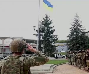 epa10175640 A framegrab taken from a handout video made available by the Ukrainian Defense Ministry shows Ukrainian flags flown in central Balakliya, Kharkiv oblast, Ukraine, 10 September 2022. The Ukrainian armed forces said they had recaptured about 2,500 square kilometres in the Kharkiv Oblast during a counter-offensive as of 09 September. Russian troops on 24 February invaded Ukrainian territory, starting a conflict that has provoked destruction and a humanitarian crisis.  EPA/UKRAINE DEFENSE MINISTRY / HANDOUT BEST QUALITY AVAILABLE HANDOUT EDITORIAL USE ONLY/NO SALES