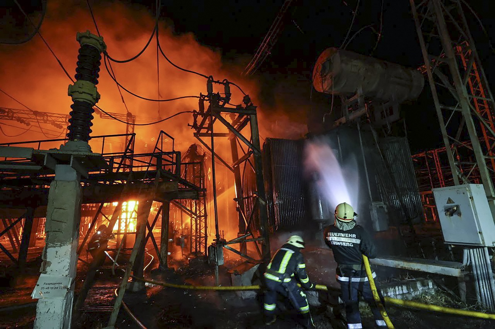 epa10178852 Ukrainian rescuers extinguish a fire after a rocket hit an infrastructure object in  Kharkiv, Ukraine, 11 September 2022 amid Russia's military invasion. Energy and water supply disappeared on Sunday evening in many districts of Kharkiv after Russian rockets hit an infrastructure facility, Mayor Ihor Terekhov said. Kharkiv and surrounding areas have been the target of heavy shelling since February 2022, when Russian troops entered Ukraine starting a conflict that has provoked destruction and a humanitarian crisis.  EPA/SERGEY KOZLOV