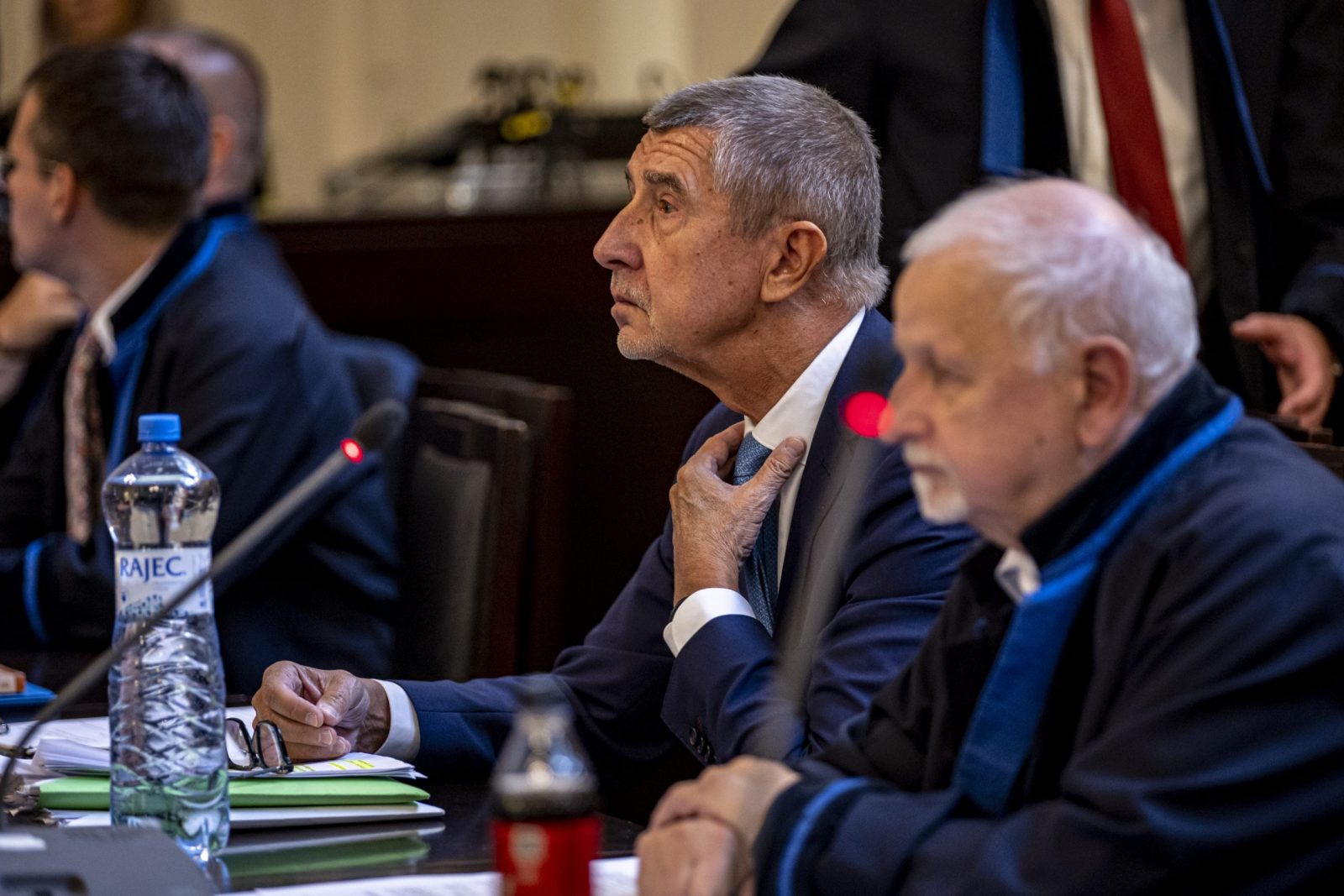epa10179284 Czech former Prime Minister Andrej Babis (C), next to his lawyers, attends his trial at the Prague Municipal Court in Prague, Czech Republic, 12 September 2022. Babis is standing trial for alleged misuse of EU subsidies amounting to a total of 50 million Czech crowns (1.9 million euro) which were invested into the Capi Hnizdo (Stork's Nest) farm in Central Bohemia.  EPA/MARTIN DIVISEK