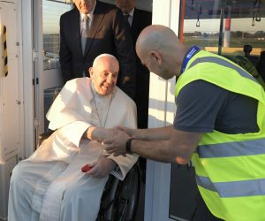 epa10180890 A handout picture provided by the Vatican Media shows Pope Francis (C) boarding a plane from a lift designed for the boarding and disembarking of reduced mobility passengers, at Fiumicino Leonardo Da Vinci Airport, Italy, 13 September 2022. Pope Francis departs for a three-day trip to Kazakhstan.  EPA/VATICAN MEDIA HANDOUT  HANDOUT EDITORIAL USE ONLY/NO SALES