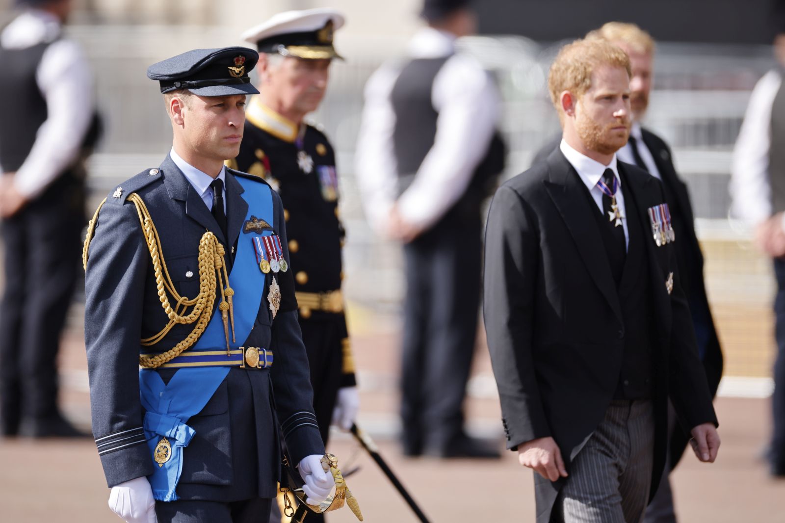 epa10183700 Britain's William, Prince of Wales (L) and Prince Harry, Duke of Sussex (R) follow the coffin containing the body of Queen Elizabeth II as it makes its way from Buckingham Palace to Westminster Hall in London, Britain, 14 September 2022. After a short service, the Queen’s lying in state will begin, lasting for four days and ending on the morning of the state funeral on the 19 September.  EPA/TOLGA AKMEN