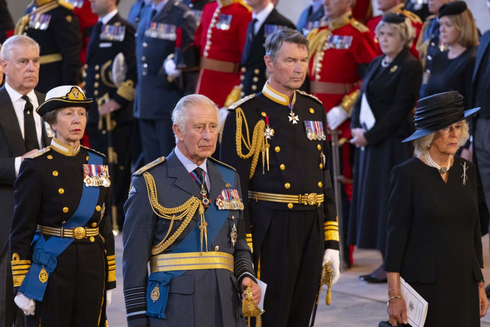 epa10184691 A handout photograph released by the UK Parliament shows Britain's King Charles III (C), Camilla, Queen Consort (R), Princess Anne, the Princess Royal (2-R), Vice Admiral Sir Timothy Laurence (2-L) and Prince Andrew, Duke of York (L) attending the service for the commencement of the Lying-in-State of Britain's Queen Elizabeth II at the Palace of Westminster in London, Britain, 14 September 2022. The queen's lying in state will last for four days, ending on the morning of the state funeral on the 19 September.  EPA/UK PARLIAMENT/ROGER HARRIS HANDOUT -- MANDATORY CREDIT: UK PARLIAMENT/ROGER HARRIS -- HANDOUT EDITORIAL USE ONLY/NO SALES