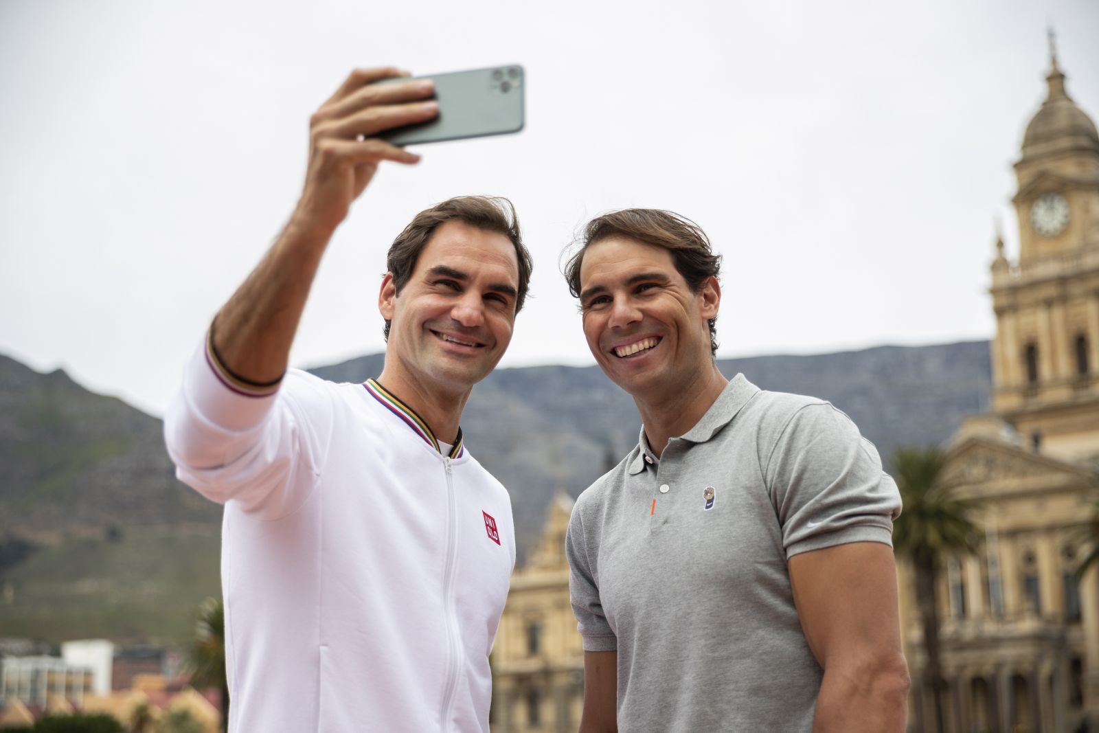 epa10185695 (FILE) - Roger Federer of Switzerland (L) and Rafael Nadal of Spain (R) take a selfie after playing mini tennis on the Cape Town Grand Parade infront of the City Hall and Table Mountain ahead of their exhibition match, South Africa 07 February 2020 (reissued 15 September 2022). Federer on 15 September 2022 released a statement reading that the Laver Cup held on 23-25 September in London will be his final ATP event to compete in.  EPA/NIC BOTHMA *** Local Caption *** 55855978
