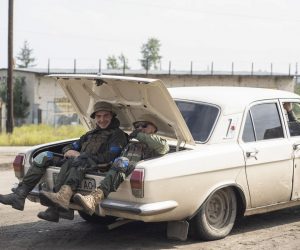 epa10188668 Ukrainian servicemen ride in the trunk of a car in the recently recaptured city of Izyum, Kharkiv region, northeastern Ukraine, 16 September 2022, amid Russia's invasion. The Ukrainian army pushed Russian troops from occupied territory in the northeast of the country in a counterattack. Kharkiv and surrounding areas have been the target of heavy shelling since February 2022, when Russian troops entered Ukraine starting a conflict that has provoked destruction and a humanitarian crisis.  EPA/ANASTASIA VLASOVA