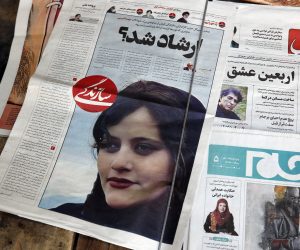 epa10191412 Iranian daily newspapers reporting Mahsa Amini’s death, in Tehran, Iran, 18 September 2022. Mahsa Amini, a 22 year old girl, was detained on 13 September by the police unit responsible for enforcing Iran's strict dress code for women. Amini was declared dead on 16 September, after she spent 3 days in a coma. Protests broke out in Saqez, hometown of Amini during her funeral on 17 September.  EPA/ABEDIN TAHERKENAREH