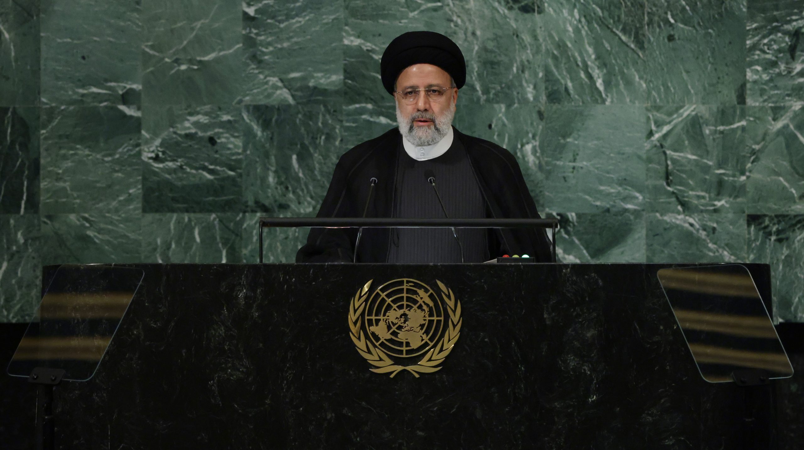 epa10196837 President Seyyed Ebrahim Raisi of Iran delivers his address during the 77th General Debate inside the General Assembly Hall at United Nations Headquarters in New York, New York, USA, 21 September 2022.  EPA/JUSTIN LANE