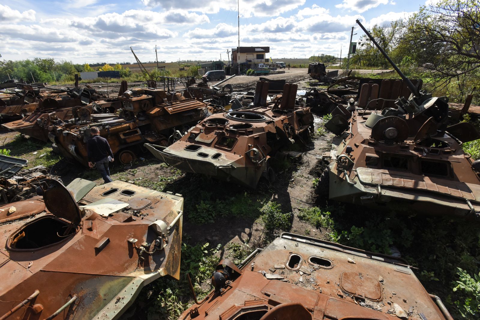 epa10199822 A junkyard of destroyed army vehicles in Izyum, Kharkiv region, Ukraine, 22 September 2022. The Ukrainian army pushed Russian troops from occupied territory in the northeast of the country in a counterattack. Kharkiv and surrounding areas have been the target of heavy shelling since February 2022, when Russian troops entered Ukraine starting a conflict that has provoked destruction and a humanitarian crisis.  EPA/OLEG PETRASYUK