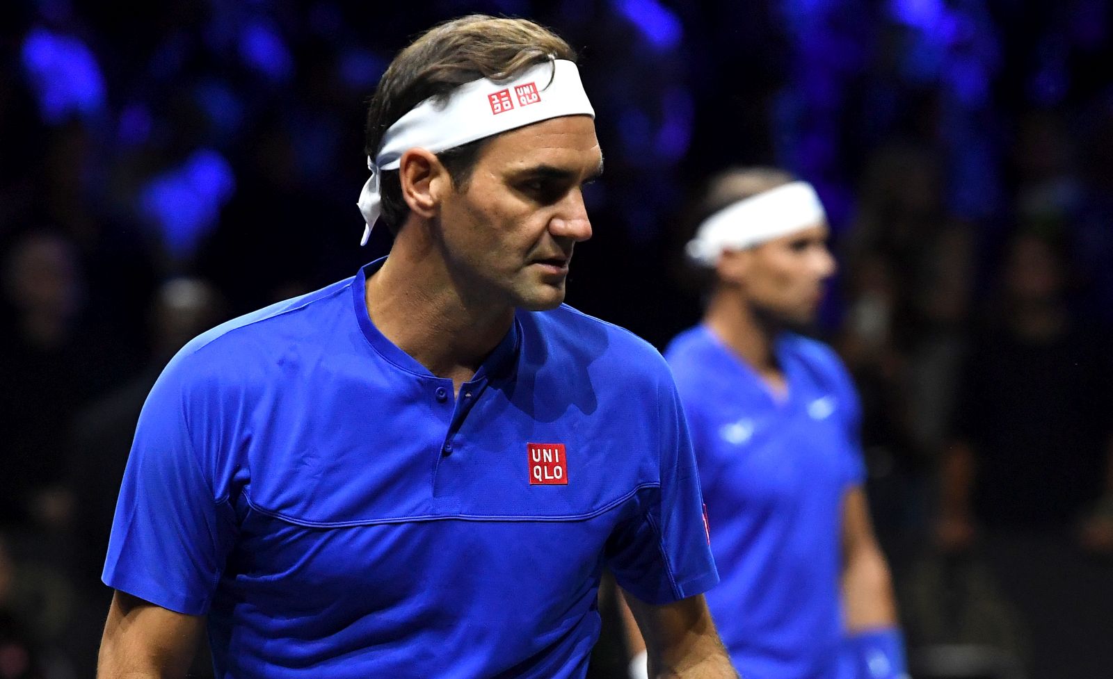 epa10202591 Team Europe double Roger Federer (foreground) of Switzerland and Rafael Nadal of Spain in their match against Team World double Jack Sock of the US and Frances Tiafoe of the US on the first day of the Laver Cup tennis tournament in London, Britain, 23 September 2022.  EPA/ANDY RAIN