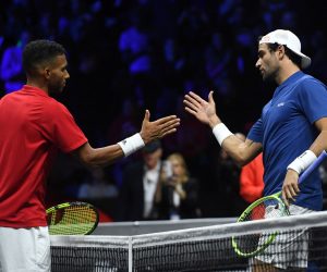 epa10203699 Matteo Berrettini of Team Europe (R) following his win over Felix Auger-Aliassime (L) of Team World during a Laver Cup tennis match at the O2 Arena in London, Britain, 24 September 2022.  EPA/ANDY RAIN
