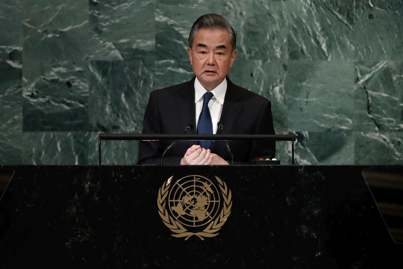 epa10204000 Chinese Foreign Minister Wang Yi delivers his address during the 77th General Debate inside the General Assembly Hall at United Nations Headquarters in New York, New York, USA, 24 September 2022.  EPA/Peter Foley