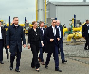 epa10209139 Polish President Andrzej Duda (L), Polish Prime Minister Mateusz Morawiecki (R) and Danish Prime Minister Mette Frederiksen (C) participates in the official opening of the 'Baltic Pipe' gas pipeline on the premises of the gas compressor station in the vicinity of Budno near Goleniow, Poland, 27 September 2022. The Baltic Pipe gas pipeline is to create a new route of natural gas supplies from Norway to the Danish and Polish markets as well as to end users in neighboring countries.  EPA/MARCIN BIELECKI POLAND OUT