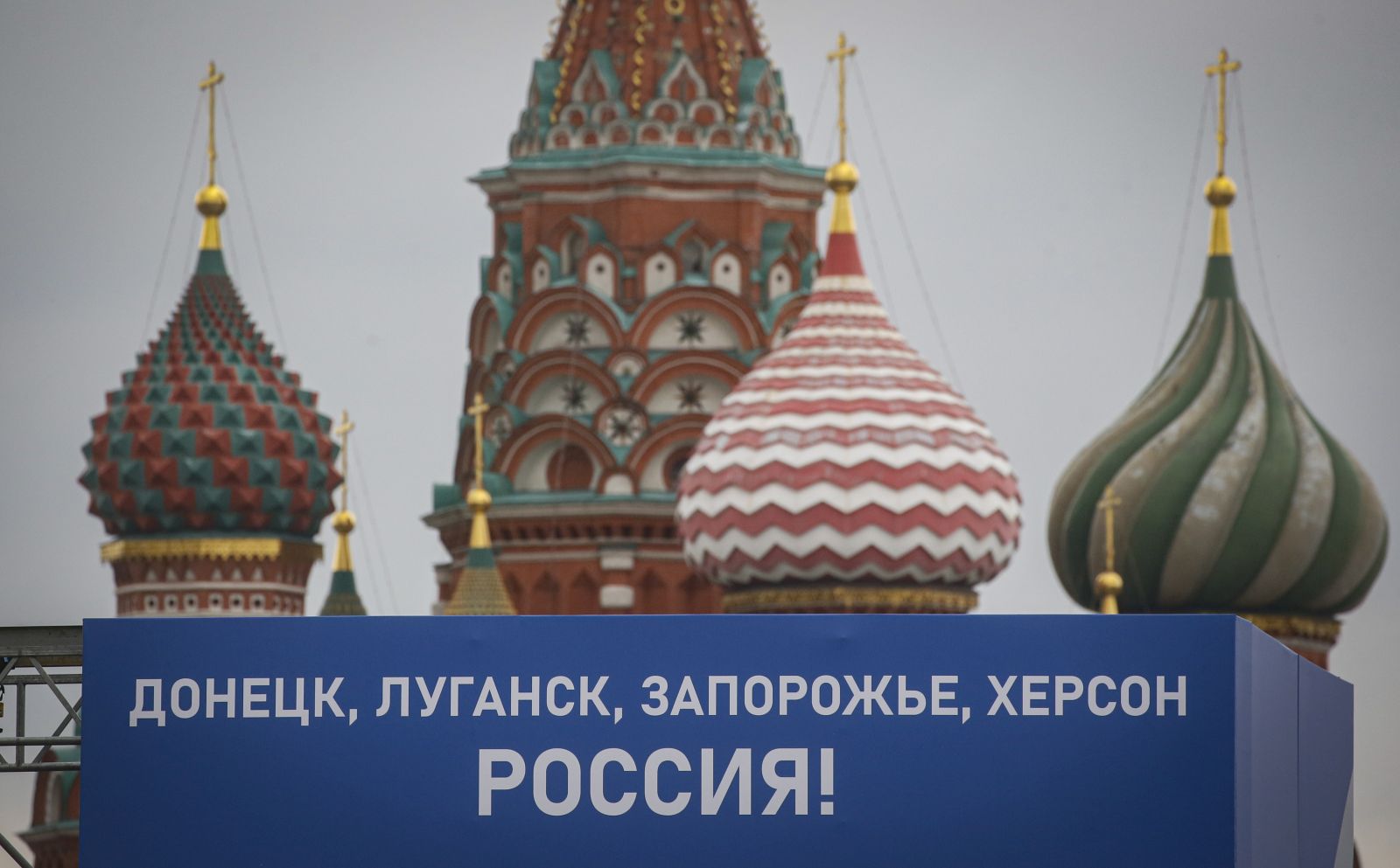 epa10213768 A stage featuring a sign reading 'Donetsk, Luhansk, Zaporozhye, Kherson Russia' during preparations for a celebration in front of St. Basil's Cathedral in downtown of Moscow, Russia, 29 September 2022. From 23 to 27 September, residents of the self-proclaimed Luhansk and Donetsk People's Republics as well as the Russian-controlled areas of the Kherson and Zaporizhzhia regions of Ukraine voted in a so-called 'referendum' to join the Russian Federation. Russian President Vladimir Putin will hold a signing ceremony September 30 to annex four more areas of Ukraine after the referendums condemned by Ukraine and the West as a sham.  EPA/SERGEI ILNITSKY