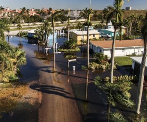 epa10215981 An aerial photo made with a drone shows flooding in the wake of Hurricane Ian in Ft Myers, Florida, 30 September 2022. The category 4 hurricane made land fall on 28 September causing widespread damage and power outages.  EPA/TANNEN MAURY
