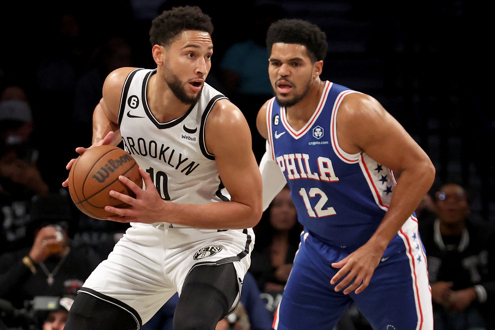 Oct 3, 2022; Brooklyn, New York, USA; Brooklyn Nets guard Ben Simmons (10) controls the ball against Philadelphia 76ers forward Tobias Harris (12) during the first quarter at Barclays Center. Mandatory Credit: Brad Penner-USA TODAY Sports
