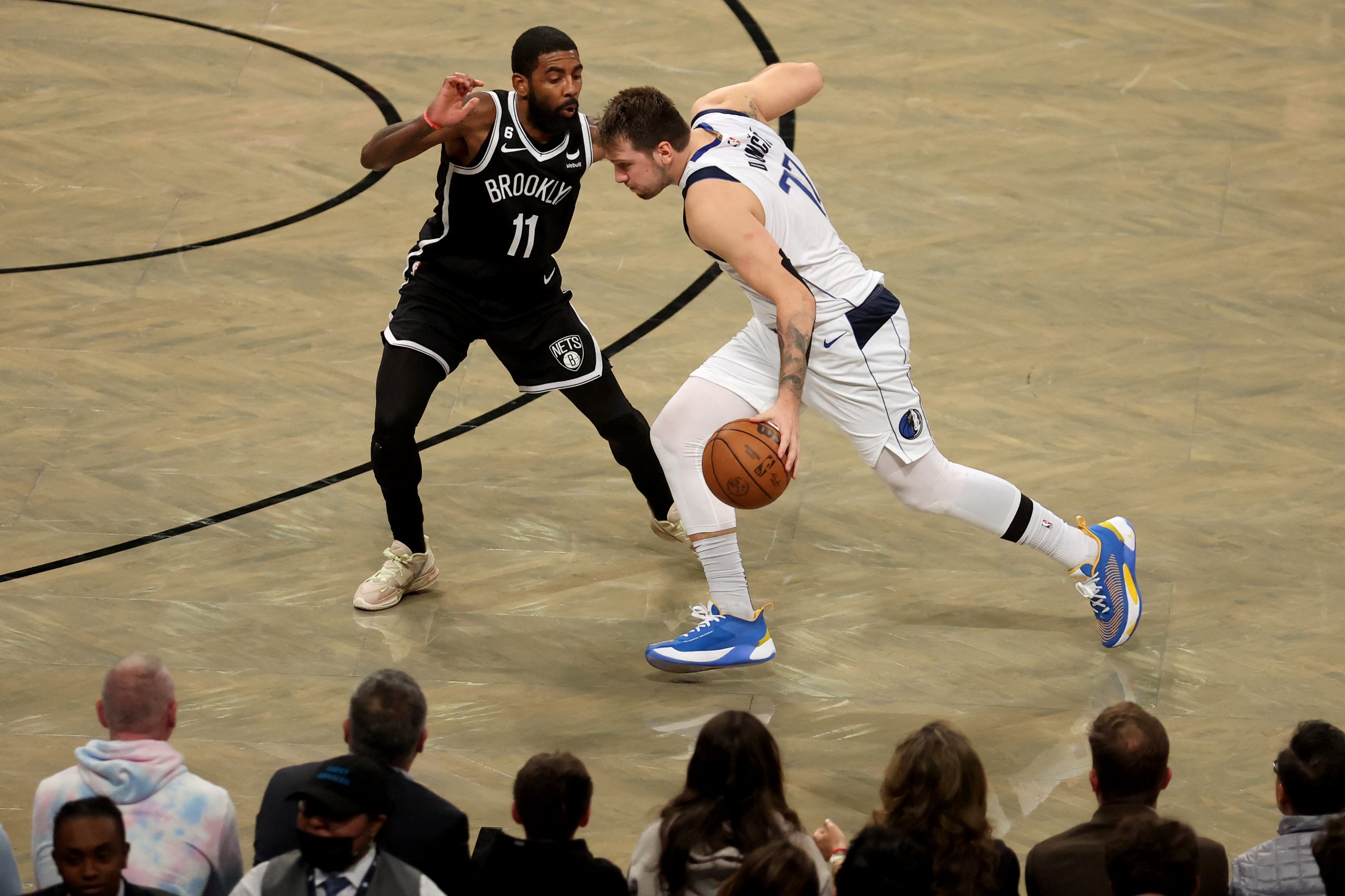 Oct 27, 2022; Brooklyn, New York, USA; Dallas Mavericks guard Luka Doncic (77) controls the ball against Brooklyn Nets guard Kyrie Irving (11) during the fourth quarter at Barclays Center. Mandatory Credit: Brad Penner-USA TODAY Sports