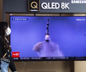 epa10214809 A woman watches the news about a North Korea ballistic missile launch, at a station in Seoul, South Korea, 30 September 2022. According to South Korea's Joint Chiefs of Staff (JCS), Pyongyang launched two more ballistic missiles towards the East Sea on the evening of 29 September, hours after the US vice president met with South Korea's head of state in Seoul. Two more missiles were also tested on 28 September.  EPA/JEON HEON-KYUN
