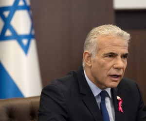 epa10219016 Israeli Prime Minister Yair Lapid gives an opening statement as he chairs the weekly cabinet meeting in Jerusalem, 02 October 2022.  EPA/Maya Alleruzzo / POOL