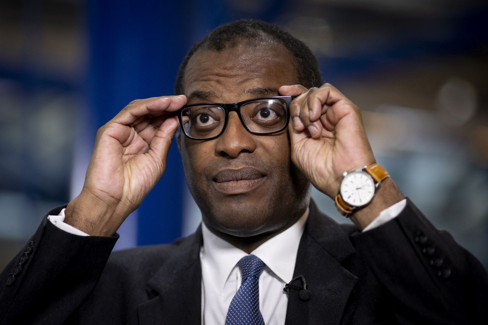 epa10220791 Britain's Chancellor of the Exchequer Kwasi Kwarteng gives an interview at the Conservative Party Conference in Birmingham, Britain, 03 October 2022. The government announced a U-turn on scrapping the 45p tax rate, which is paid by people earning over 150,000 British pound (171,080.80 euro) a year, following a week of market turmoil and the British pound going historic low against the US dollar.  EPA/TOLGA AKMEN