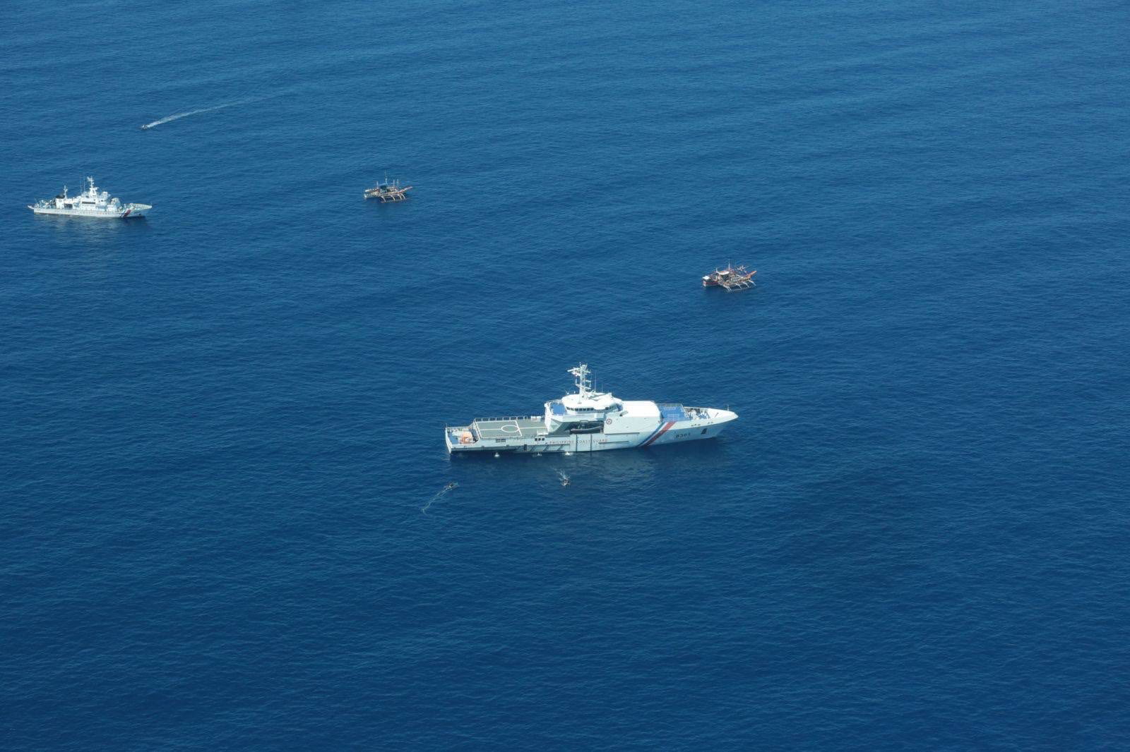 epa10226206 A handout aerial photo made available by Philippine Coast Guard (PCG) shows Chinese Coastguard ships patrolling in the vicinity of the disputed Scarborough Shoal in the South China Sea, Philippines, 06 September 2022. In a statement issued by the Philippine Coast Guard Commandant Admiral Artemio M Abu, the PCG monitored four China Coast Guard (CCG) vessels and Chinese military vessels in the vicinity of the Scarborough Shoal during an aerial surveillance operation.  EPA/PCG / HANDOUT BEST QUALITY AVAILABLE HANDOUT EDITORIAL USE ONLY/NO SALES