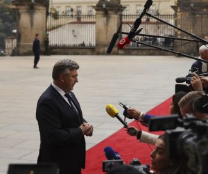 epa10226420 Croatian Prime Minister Andrej Plenkovic speaks to media upon arrival during the Meeting of the European Political Community in Prague, Czech Republic, 06 October 2022. The first meeting of the European Political Community brings together leaders from across the continent including non EU members countries with the aims to foster political dialogue and cooperation and to strengthen the continent's security, stability and prosperity, a statement by the European Council reads.  EPA/FILIP SINGER