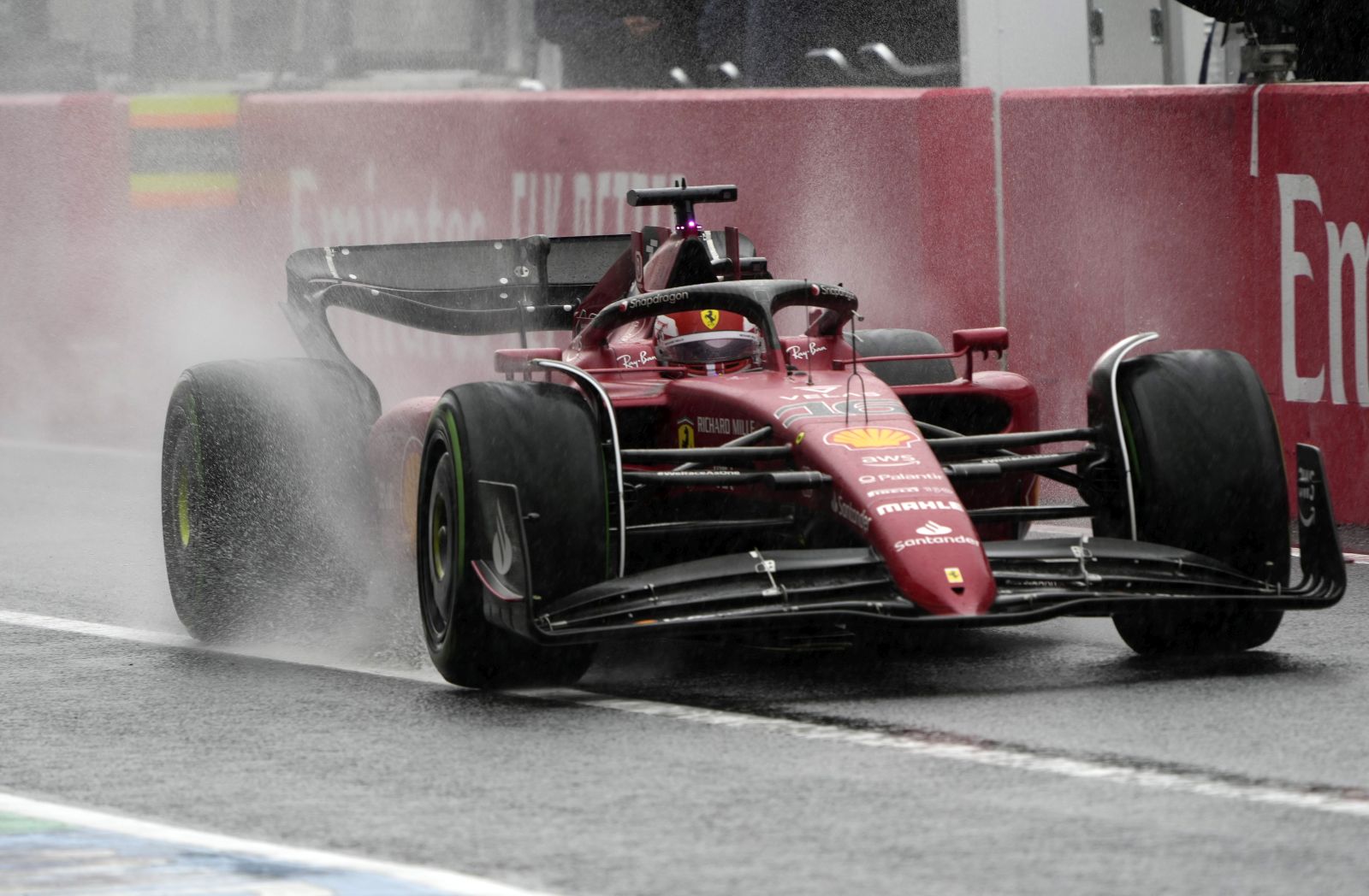 epa10228544 Monaco's Formula One driver Charles Leclerc of Scuderia Ferrari steers his car in the pit lane during the first practice session of the Japanese Formula One Grand Prix in Suzuka, Japan, 07 October 2022. The Japanese Formula One Grand Prix will take place on 09 October 2022.  EPA/FRANCK ROBICHON