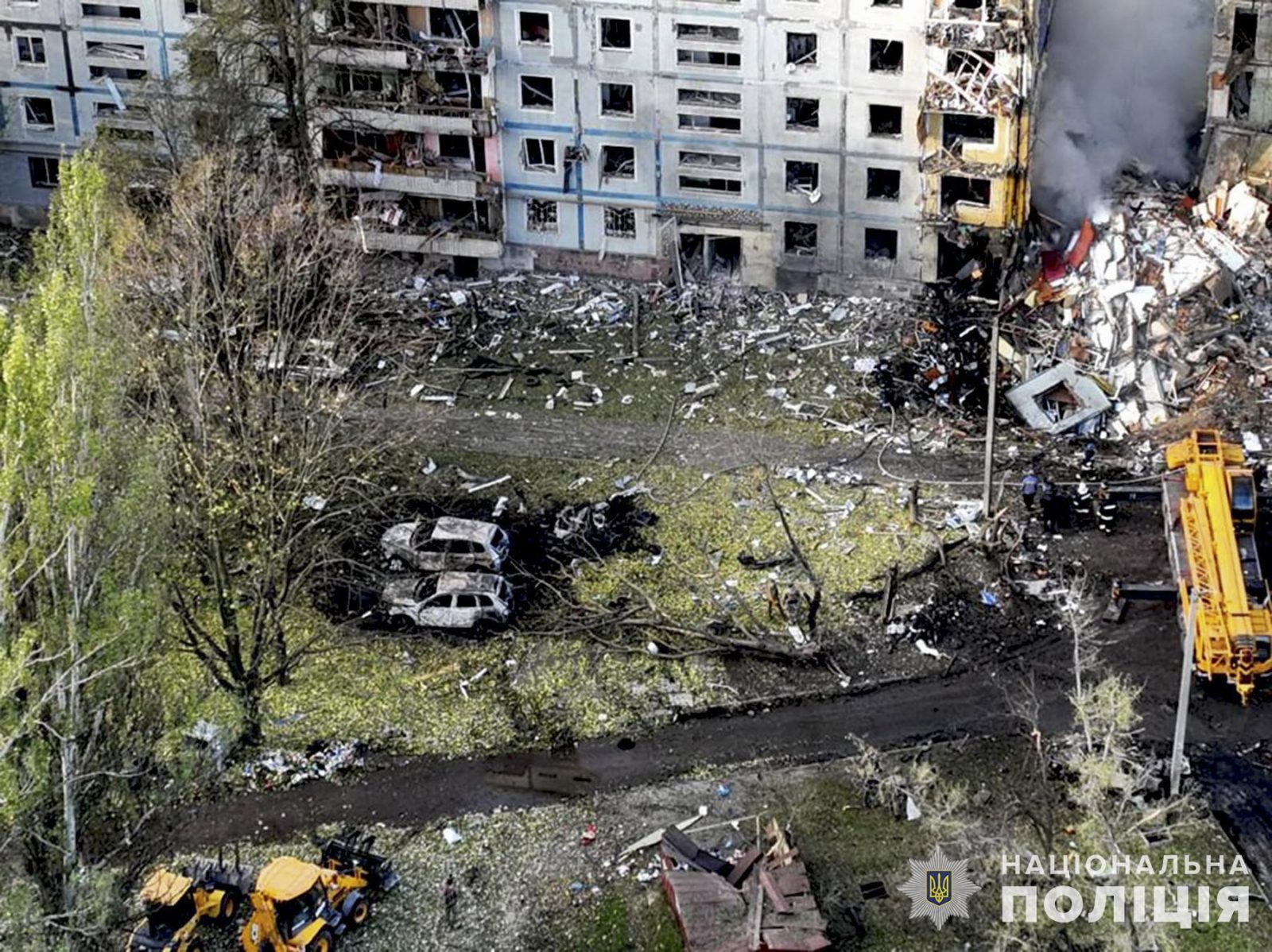 epa10232719 A handout photo made available by the National Police press service shows Ukrainian rescuers work at the site of a private building in the aftermath of a shelling in Zaporizhzhia, Ukraine, 09 October 2022. At least 17 persons were killed and 49 injured as Anatoly Kurtev, Secretary of the Zaporizhzhia City Council said. A 9-storey building and five private houses were partially destroyed. More than 50 high-rise buildings and 20 private sector buildings were damaged according to the Ukrainian Security Service. Russian troops entered Ukraine on 24 February 2022 starting a conflict that has provoked destruction and a humanitarian crisis.  EPA/UKRAINE NATIONAL POLICE HANDOUT  HANDOUT EDITORIAL USE ONLY/NO SALES