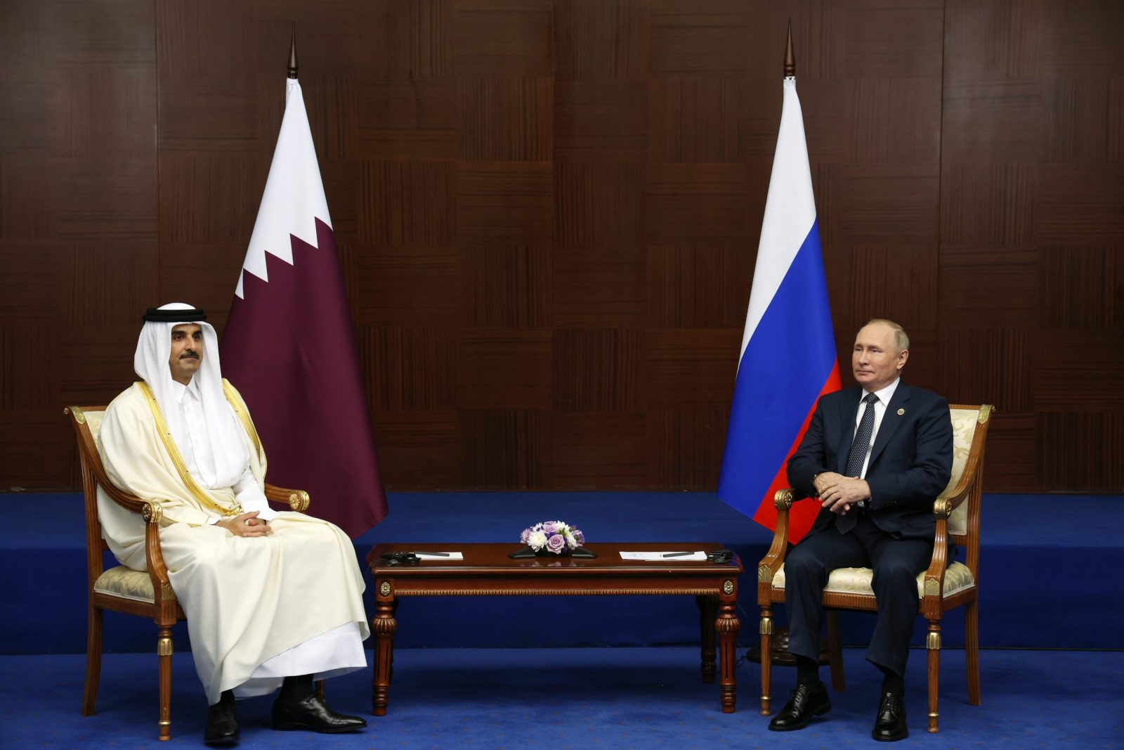 epa10240257 Emir of Qatar Sheikh Tamim Bin Hamad Al-Thani (L) and Russian President Vladimir Putin (R) attend a meeting on the sidelines of the 6th Summit of the Conference on Interaction and Confidence Building Measures in Asia (CICA) in Astana, Kazakhstan, 13 October 2022.  EPA/VYACHESLAV PROKOFIYEV / KREMLIN / SPUTNIK  POOL MANDATORY CREDIT