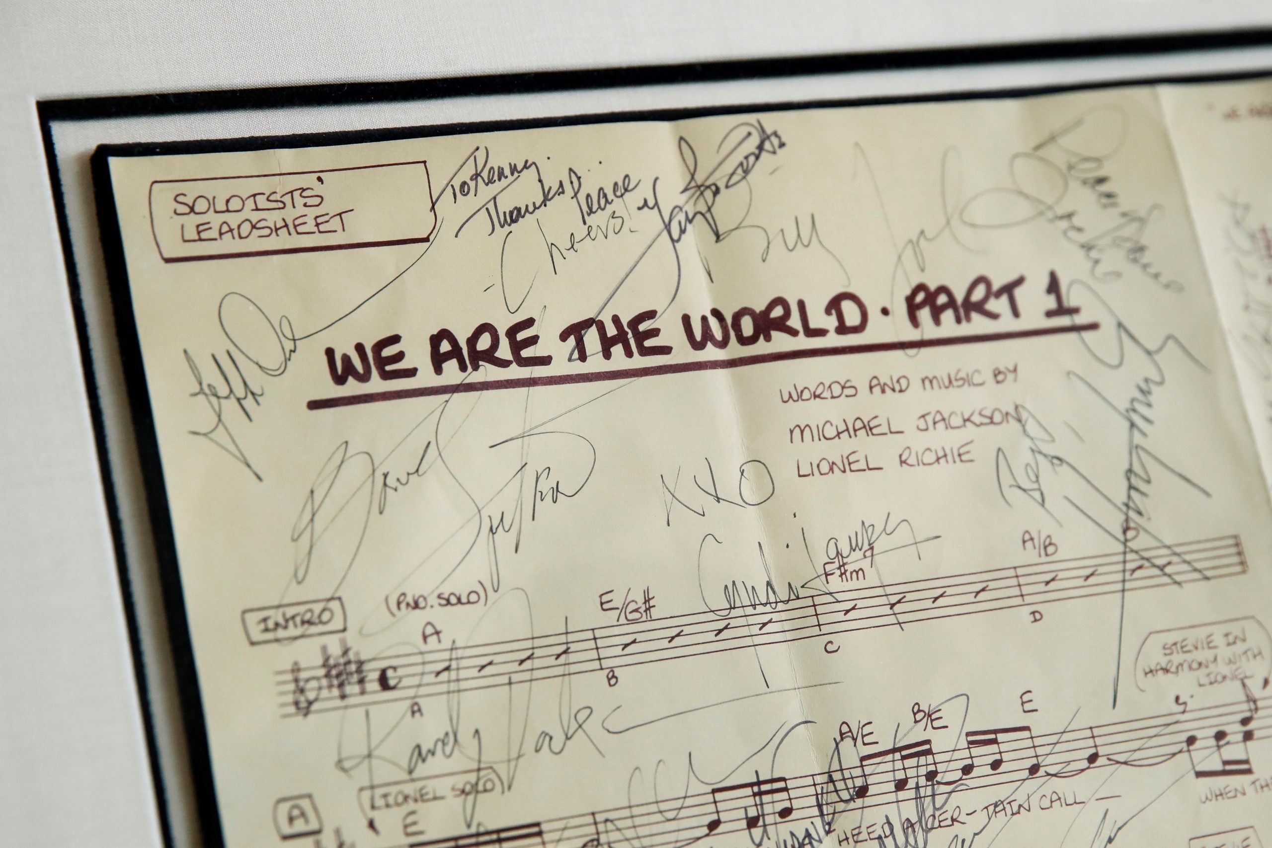 epa10249652 Kenny Rogers 'We Are The World' signed soloist leadsheets are displayed during an auction preview titled 'Property from the Estate of Kenny Rogers' at Julien's Auctions Beverly Hills, in Beverly Hills California, USA, 17 October 2022. The auction will take place at Julien's Auctions Beverly Hills and online from 21 to 22 October 2022.  EPA/CAROLINE BREHMAN