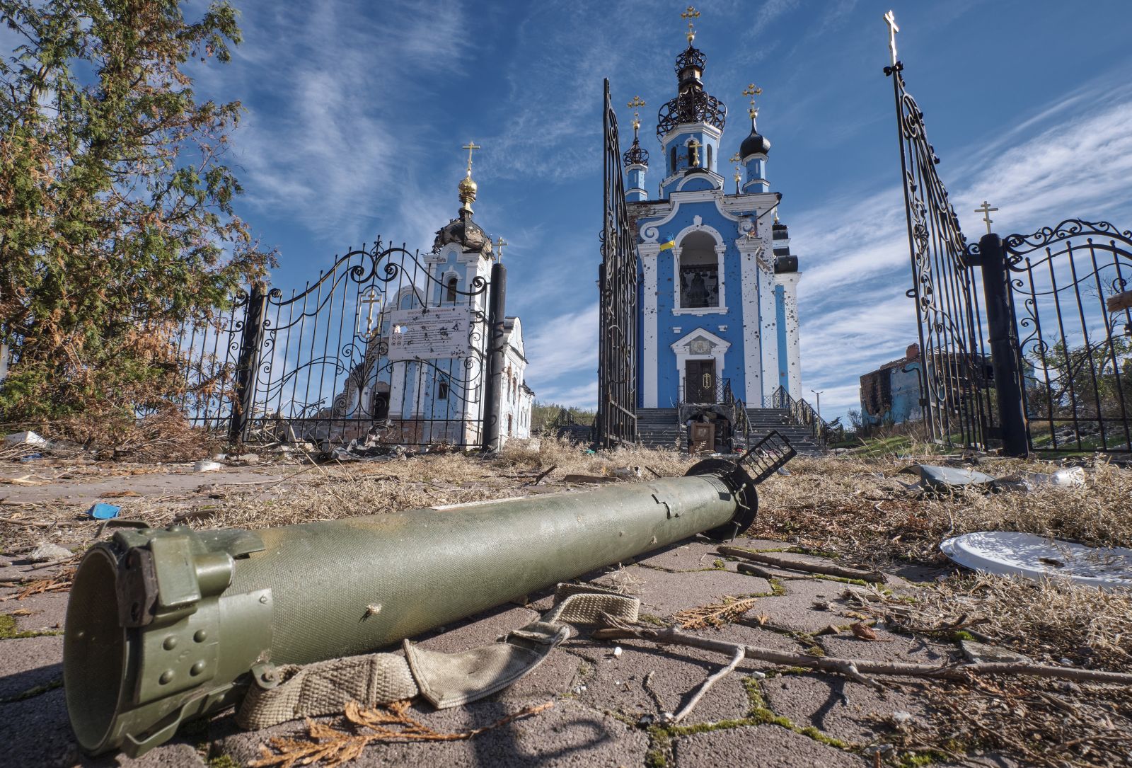 epa10252848 A part of military ammunition lies in front of the destroyed church, which is part of Sviatohirsk Lavra, in the Bohorodychne village of Donetsk area, Ukraine, 19 October 2022 amid the Russian invasion. Bohorodychne village was captured by Russian troops in the summer of 2022 during their offensive on Sviatohirsk and was liberated by the Ukrainian army in September 2022. All buildings of the village were destroyed and from almost 800 inhabitants before the war, just two people stay to live there now. The Ukrainian army pushed Russian troops from occupied territory in the northeast of the country in a counterattack. Russian troops entered Ukraine on 24 February 2022 starting a conflict that has provoked destruction and a humanitarian crisis.  EPA/YEVGEN HONCHARENKO
