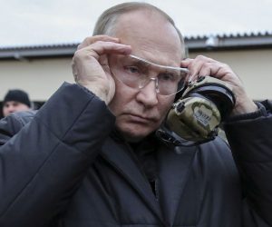 epa10255165 Russian President Vladimir Putin puts on tactical glasses as he inspects the progress of mobilized servicemen's training at a training range of the Western Military District in the Ryazan region, Russia, 20 October 2022. Russian President Putin announced in a televised address to the nation on 21 September, that he signed a decree on partial mobilization in the Russian Federation due to the conflict in Ukraine. Russian Defense Minister Shoigu said that 300,000 people would be called up for service as part of the move.  EPA/MIKHAEL KLIMENTYEV / SPUTNIK / KREMLIN POOL MANDATORY CREDIT