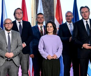 epa10256873 German Foreign Minister Annalena Baerbock (C) and counterparts from the Western Balkans countries and Austria, Bulgaria, Croatia, the Czech Republic, Greece and Slovenia pose for family photo during the opening of Western Balkans Foreign Ministers meeting as part of Western Balkans Summit Berlin 2022 at the Federal Foreign Office in Berlin, German, 21 October 2022. The Western Balkans Summit Berlin 2022 will take place on 03 November 2022.  EPA/FILIP SINGER