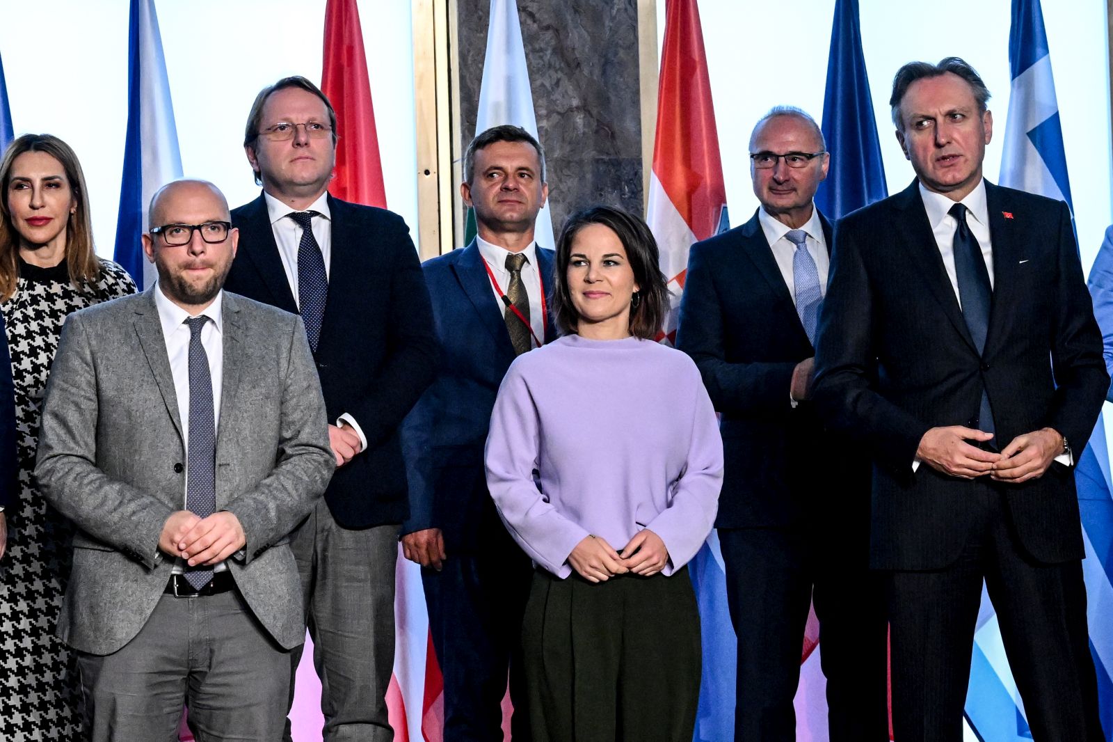 epa10256873 German Foreign Minister Annalena Baerbock (C) and counterparts from the Western Balkans countries and Austria, Bulgaria, Croatia, the Czech Republic, Greece and Slovenia pose for family photo during the opening of Western Balkans Foreign Ministers meeting as part of Western Balkans Summit Berlin 2022 at the Federal Foreign Office in Berlin, German, 21 October 2022. The Western Balkans Summit Berlin 2022 will take place on 03 November 2022.  EPA/FILIP SINGER