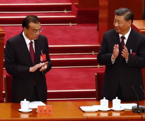 epa10258206 Chinese President Xi Jinping (R) and Premier Li Keqiang react during the closing ceremony of the 20th National Congress of the Communist Party of China (CPC) at the Great Hall of People in Beijing, China, 22 October 2022. The 20th National Congress of the Communist Party of China will close on 22 October with President Xi Jinping expected to secure a historic third five-year term in power.  EPA/WU HAO