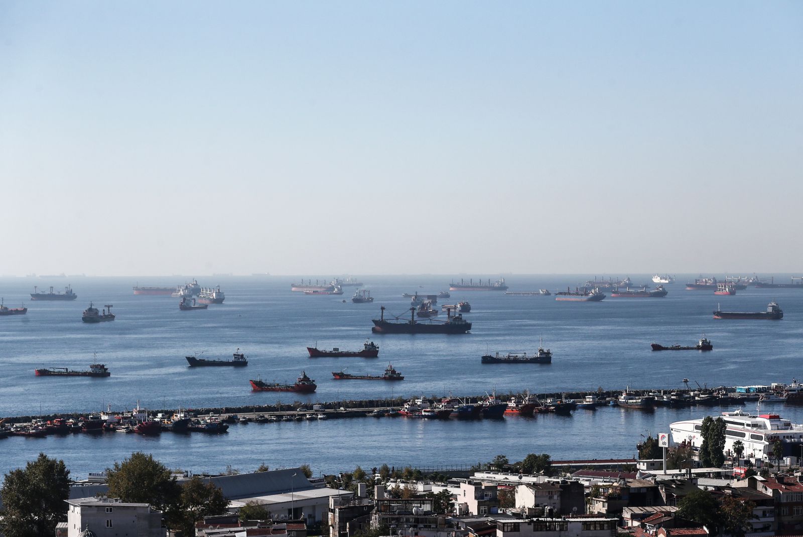 epa10258495 Cargo ships carrying Ukraine grain are anchored as they wait in line for the inspection on the Marmara sea, Istanbul, Turkey, 22 October 2022. A safe passage deal was signed between Ukraine and Russia to export Ukrainian grain on 22 July 2022 in Istanbul. The Joint Coordination Center (JCC) has risen the number of inspection teams due to increase of number of waiting ships in Istanbul.  EPA/ERDEM SAHIN