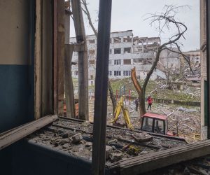 epa10267253 A local man looks out from a window of his flat in a residential building damaged in an overnight shelling in the small city of Druzhkivka, Donetsk area, Ukraine, 26 October 2022, amid the Russian invasion. The Ukrainian army pushed Russian troops from occupied territory in the northeast of the country in a counterattack. Russian troops on 24 February entered Ukrainian territory, starting a conflict that has provoked destruction and a humanitarian crisis.  EPA/YEVGEN HONCHARENKO