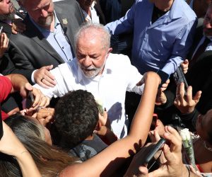epa10275100 Former Brazilian president and presidential candidate Luiz Inacio Lula da Silva greets supporters during his departure after voting in the second round of the presidential elections in Sao Bernardo do Campo, Sao Paulo, Brazil, 30 October 2022. Brazilians headed to polling stations on 30 October to decide between former President Luiz Inacio Lula da Silva or his rival, current President Jair Bolsonaro, as head of State for the 2022-2026 period.  EPA/Antonio Lacerda