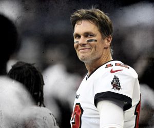 Aug 27, 2022; Indianapolis, Indiana, USA; Tampa Bay Buccaneers quarterback Tom Brady (12) smiles during the national anthem before the game against the Indianapolis Colts at Lucas Oil Stadium. Mandatory Credit: Marc Lebryk-USA TODAY Sports