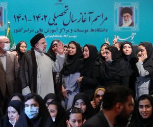 epa10230329 A handout picture made available by the Iranian presidential office shows, Iran's President Ebrahim Raisi (C) poses with female students for a picture during a ceremony marking the beginning of the academic year, at the Al-Zahra university, in Tehran, Iran, 08 October 2022. According to Iranian presidency, Raisi said that Iranian professors and students will not let enemies reach to the goal again the country pointing to recent protests in Iran.  EPA/IRANIAN PRESIDENTIAL OFFICE HANDOUT  HANDOUT EDITORIAL USE ONLY/NO SALES