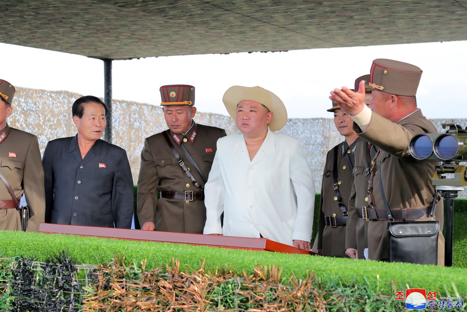 epa10233817 An undated photo released on 10 October 2022 by the official North Korean Central News Agency (KCNA) shows North Korean Supreme Leader Kim Jong-un (C) overseeing a military striking drill of long-range artillery sub-units on the front and flying corps of the Korean People's Army (KPA), carried out to check and assess the war deterrent and nuclear counterattack capability of the country, amid ongoing joint military exersizes involving US and South Korean forces in the waters near the Korean Penninsula. North Korea conducted the drills from 25 September to 09 October, and launched several ballistic missiles in order to test the efficacy of the nation's tactical nuclear warefare capabilities.  EPA/KCNA   EDITORIAL USE ONLY