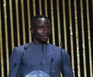 epa10249454 Sadio Mane of FC Bayern Munich addresses the audience after winning the Socrates Trophy for players who tackle social issues  during the Ballon d'Or ceremony in Paris, France, 17 October 2022. For the first time the Ballon d'Or, presented by the magazine France Football, will be awarded to the best players of the 2021-22 season instead of the calendar year.  EPA/Mohammed Badra