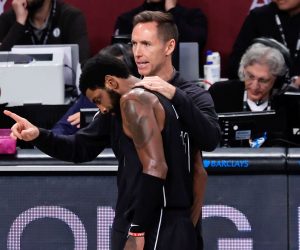 epa10257988 Brooklyn Nets guard Kyrie Irving (C) speak with his head coach Steve Nash during the first half of the NBA basketball game between the Brooklyn Nets and the Toronto Raptors at Barclays Center, in Brooklyn, New York, USA, 21 October 2022.  EPA/Peter Foley  SHUTTERSTOCK OUT
