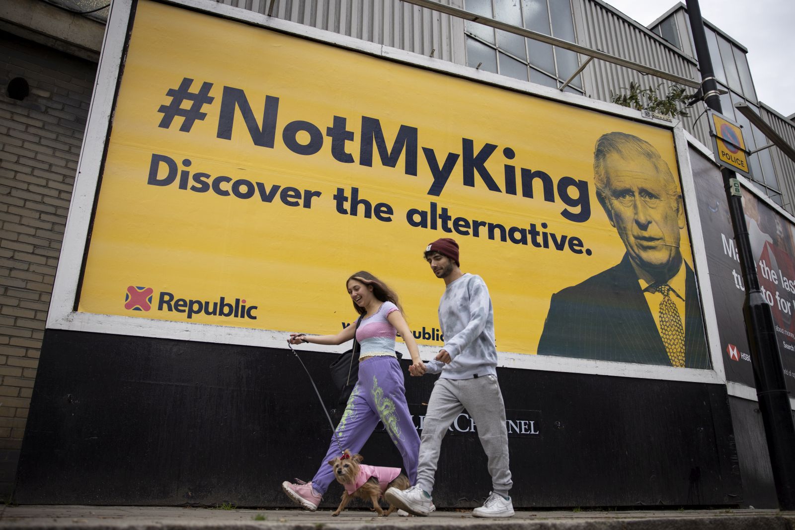 epa10277236 People walk past an anti-monarchy billboard featuring 'NotMyKing' hashtag and picture of Britain's King Charles III, made by the pressure group Republic, in London, Britain, 31 October 2022. Activists campaigning for the abolition of the monarchy in Britain make their first push since the death of Queen Elizabeth II with the launch of the billboards in 18 towns.  EPA/TOLGA AKMEN