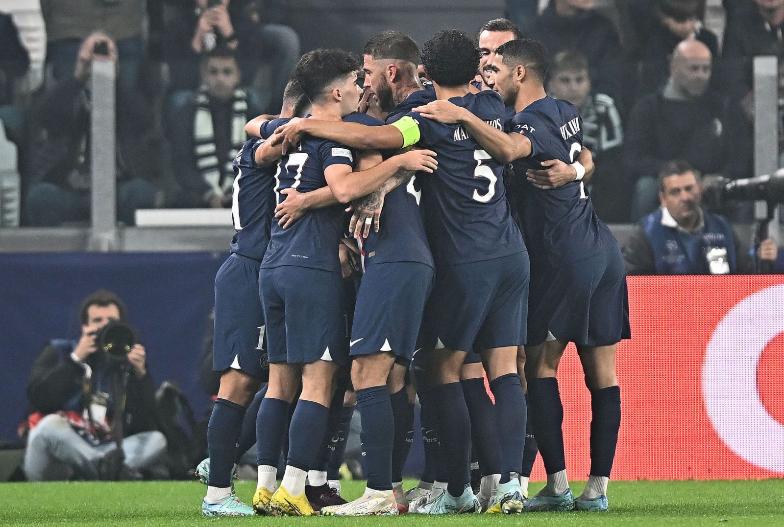 epa10282401 PSG's Kylian Mbappe celebrates with teammates after scoring the 0-1 goal during the UEFA Champions League group H soccer match between Juventus FC and Paris Saint Germain, in Turin, Italy, 02 November 2022.  EPA/ALESSANDRO DI MARCO