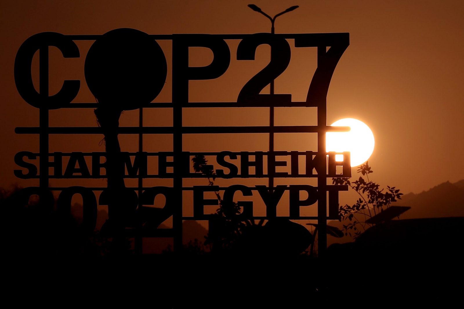 epa10286229 The sun sets behind the International Congress Center before the 2022 United Nations Climate Change Conference (COP27),  in Sharm El-Sheikh, in Egypt, 04 November 2022. The 2022 United Nations Climate Change Conference (COP27), running from 06 till 18 November in Sharm El-Sheikh, is expected to host one of the largest number of participants in the annual global climate conference of over 40,000 estimated attendees including heads of states and governments, civil society, media and other relevant stakeholders. The events will include Climate Implementation Summit, thematic days, flagship initiatives, and Green Zone activities engaging with climate and other global challenges.  EPA/SEDAT SUNA