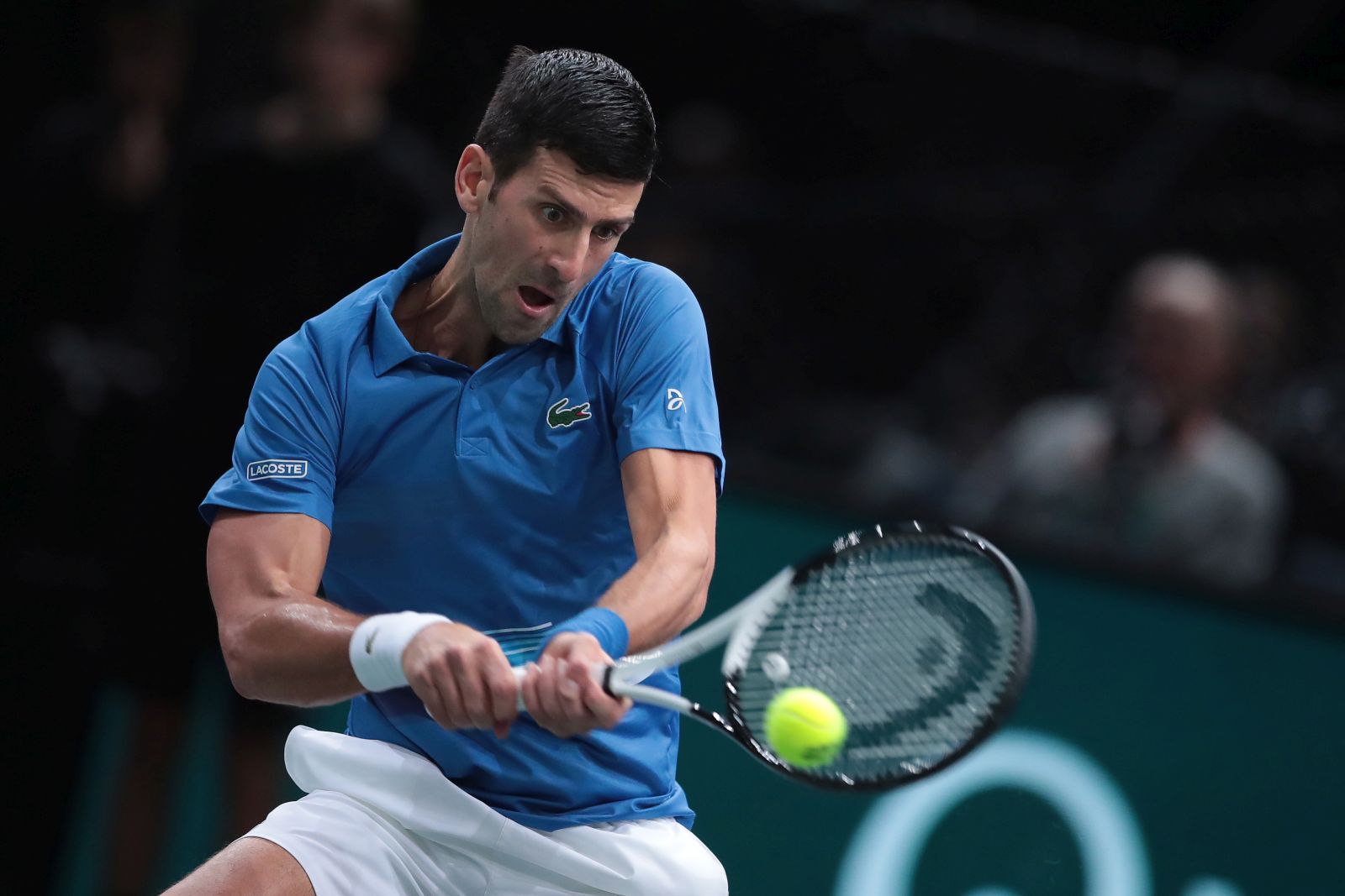 epa10290292 Novak Djokovic of Serbia in action against Holger Rune of Denmark during the final match at the Rolex Paris Masters 2022 Tennis Tournament in Paris, France, 06 November 2022.  EPA/CHRISTOPHE PETIT TESSON