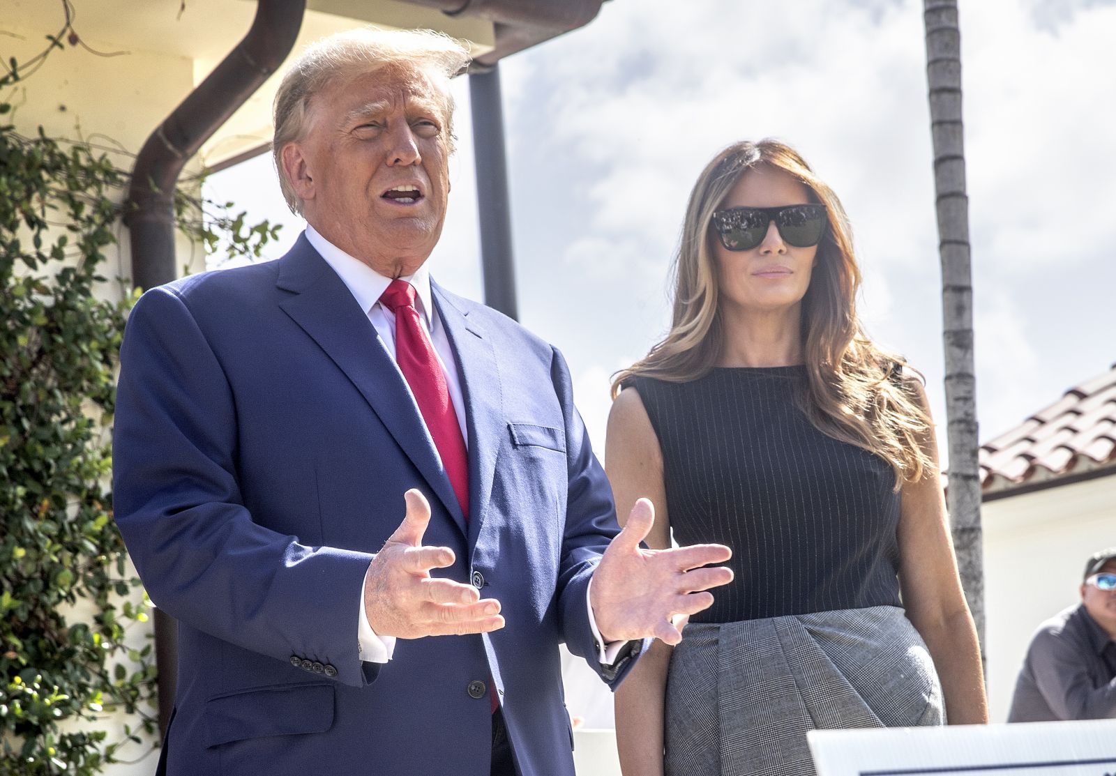 epa10294157 Former US President Donald J. Trump (L) and former First Lady Melania Trump (R), walk out of the electoral precinct after voting in-person at the Morton and Barbara Mandel Recreation Center in Palm Beach, Florida, USA, 08 October 2022. The US midterm elections are held every four years at the midpoint of each presidential term and this year include elections for all 435 seats in the House of Representatives, 35 of the 100 seats in the Senate and 36 of the 50 state governors as well as numerous other local seats and ballot issues.  EPA/CRISTOBAL HERRERA-ULASHKEVICH
