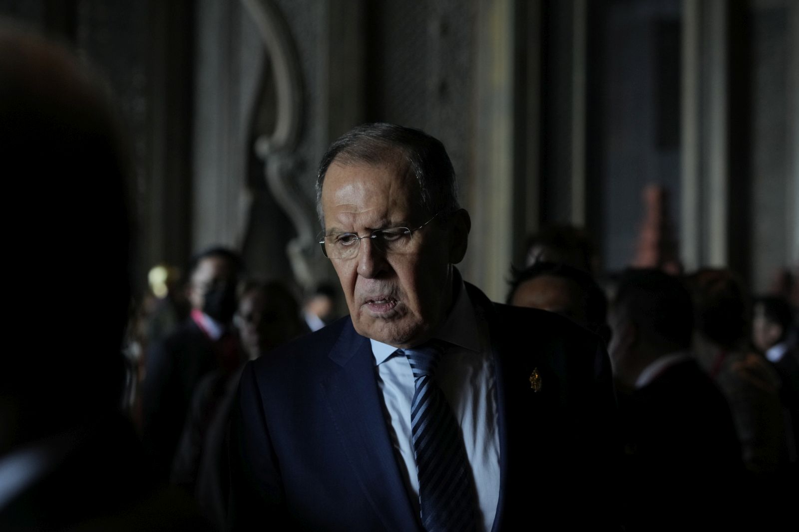 epa10306433 Russia's Foreign Minister Sergey Lavrov walks to attend a lunch as part of the G20 Leaders' Summit in Bali, Indonesia, 15 November 2022. The 17th Group of Twenty (G20) Heads of State and Government Summit runs from 15 to 16 November 2022.  EPA/ACHMAD IBRAHIM / POOL