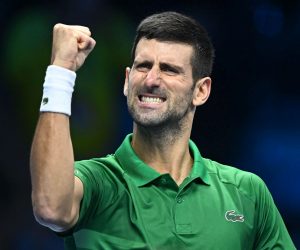 epaselect epa10306066 Novak Djokovic of Serbia celebrates after winning the match against Stefanos Tsitsipas of Greece at the Nitto ATP Finals 2022 tennis tournament at the Pala Alpitour arena in Turin, Italy, 14 November 2022.  EPA/ALESSANDRO DI MARCO